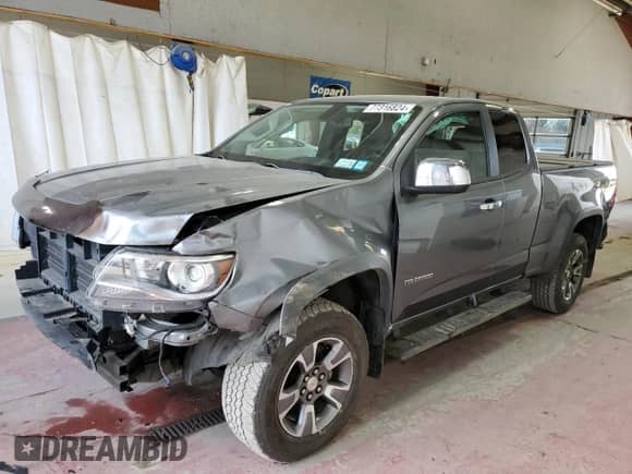 2018 Chevrolet Colorado 4WD Z71 with VIN 1GCHTDEN1J1284367, listed as a Copart auction lot 77316824 with 43,383 mi miles and Salvage title. Bid and sale history available at DreamBid. Image 1.
