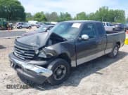 ✅ 2002 Ford F-150 XL • VIN: 1FTRX17W32NB96282 • Lot: 42753289. Listed on IAAI with 131,503 mi. Free auction sales archive from the USA and detailed vehicle history report at DreamBid. Image 2.