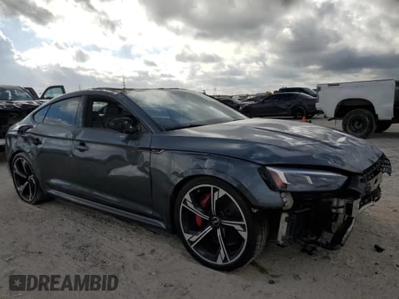 ✅ 2019 Audi RS 5 Sportback • VIN: WUABWCF55KA906835 • Лот: 85359985. Опубликован ранее на Copart с пробегом 52 543 миль. Бесплатный доступ к архиву аукционных продаж из США и подробный отчёт об истории автомобиля на DreamBid. Изображение 4.