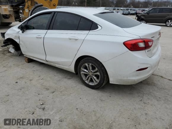 ✅ 2019 Chevrolet Cruze LT • VIN: 1G1BE5SM4K7126291 • Lot: 36614773. Listed on Copart with 65,739 mi. Free auction sales archive from the USA and detailed vehicle history report at DreamBid. Image 2.