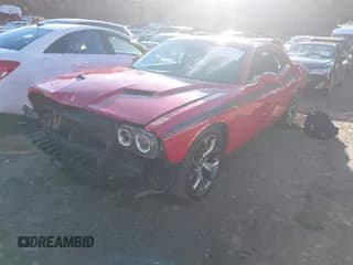 ✅ 2015 Dodge Challenger R/T Plus • VIN: 2C3CDZBT1FH910598 • Lot: 43764910. Listed on IAAI with 104,233 mi. Free auction sales archive from the USA and detailed vehicle history report at DreamBid. Image 2.