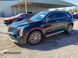 ✅ 2019 Cadillac XT4 FWD Premium Luxury • VIN: 1GYFZCR44KF159508 • Lot: 91915515. Listed on Copart with 82,527 mi. Free auction sales archive from the USA and detailed vehicle history report at DreamBid. Image 1.