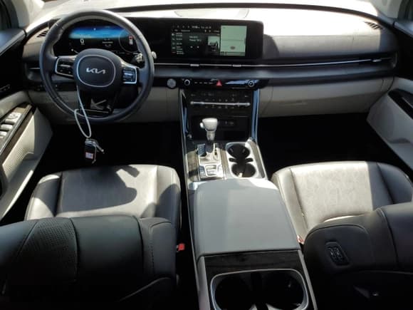 ✅ 2024 Kia Carnival SX • VIN: KNDNE5H39R6318793 • Лот: 65808655. Опубликован ранее на Copart с пробегом 57 648 миль. Бесплатный доступ к архиву аукционных продаж из США и подробный отчёт об истории автомобиля на DreamBid. Изображение 8.