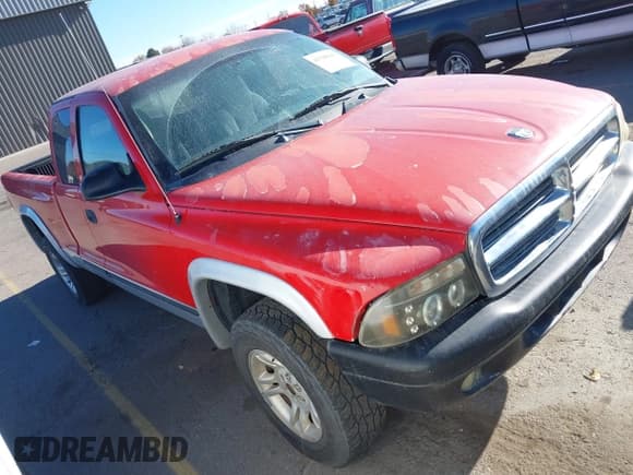 ✅ 2003 Dodge Dakota • VIN: 1D7HG42X23S164610 • Lot: 43700263. Wystawiony na IAAI z przebiegiem 173 877 mil. Bezpłatny archiwum sprzedaży aukcyjnych z USA i szczegółowy raport historii pojazdu na DreamBid. Zdjęcie 1.