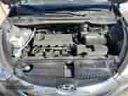 2013 Hyundai Tucson GLS z VIN KM8JU3ACXDU579530, wystawiony jako Copart lot #74814144 z przebiegiem 140 443 mil mil oraz Szkoda całkowita • Salvage title. Historia ofert i sprzedaży dostępna na DreamBid. Obrazek 12.