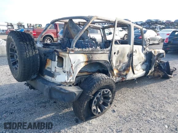 ✅ 2010 Jeep Wrangler Unlimited Sport • VIN: 1J4BB3H1XAL186562 • Lot: 42485990. Listed on IAAI with Not provided. Free auction sales archive from the USA and detailed vehicle history report at DreamBid. Image 4.