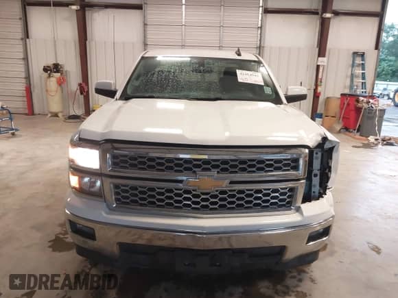 2015 Chevrolet Silverado 1500 LT z VIN 1GCRCREH0FZ398560, wystawiony jako IAAI lot #42454940 z przebiegiem 158 025 mil mil oraz . Historia ofert i sprzedaży dostępna na DreamBid. Obrazek 13.