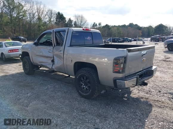 2009 Chevrolet Silverado 1500 LS with VIN 3GCEK13C89G153861, listed as a IAAI auction lot 41587774 with 179,670 mi miles and . Bid and sale history available at DreamBid. Image 3.