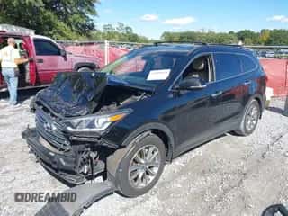 2017 Hyundai Santa Fe SE z VIN KM8SN4HFXHU237721, wystawiony jako IAAI lot #43580839 z przebiegiem 129 210 mil mil oraz . Historia ofert i sprzedaży dostępna na DreamBid. Obrazek 2.