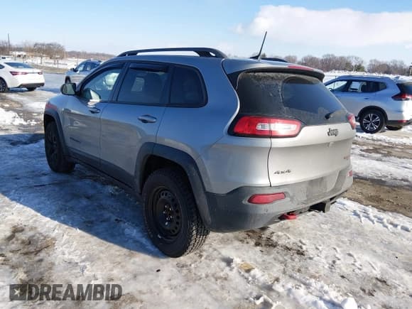 ✅ 2016 Jeep Cherokee Trailhawk • VIN: 1C4PJMBS7GW146632 • Lot: 43852317. Listed on IAAI with 96,866 mi. Free auction sales archive from the USA and detailed vehicle history report at DreamBid. Image 3.