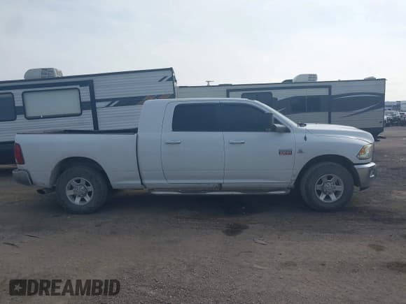 ✅ 2010 Dodge RAM • VIN: 3D7TP2HLXAG130647 • Lot: 43524164. Listed on IAAI with 438,782 mi. Free auction sales archive from the USA and detailed vehicle history report at DreamBid. Image 13.