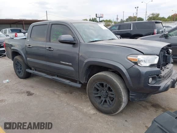 ✅ 2020 Toyota Tacoma SR5 • VIN: 3TMAZ5CN9LM140418 • Lot: 43476369. Listed on IAAI with 75,517 mi. Free auction sales archive from the USA and detailed vehicle history report at DreamBid. Image 1.
