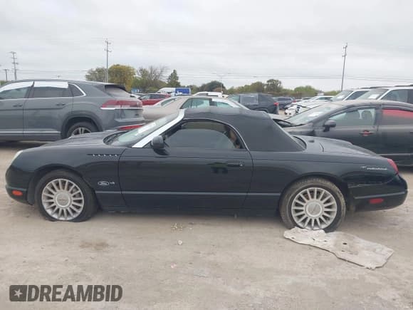 ✅ 2004 Ford Thunderbird Deluxe • VIN: 1FAHP60A14Y104987 • Лот: 43709571. Опубликован ранее на IAAI с пробегом 101 840 миль. Бесплатный доступ к архиву аукционных продаж из США и подробный отчёт об истории автомобиля на DreamBid. Изображение 14.