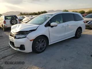✅ 2025 Honda Odyssey Touring • VIN: 5FNRL6H82SB004745 • Lot: 65039675. Wystawiony na Copart z przebiegiem 18 167 mil. Bezpłatny archiwum sprzedaży aukcyjnych z USA i szczegółowy raport historii pojazdu na DreamBid. Zdjęcie 1.
