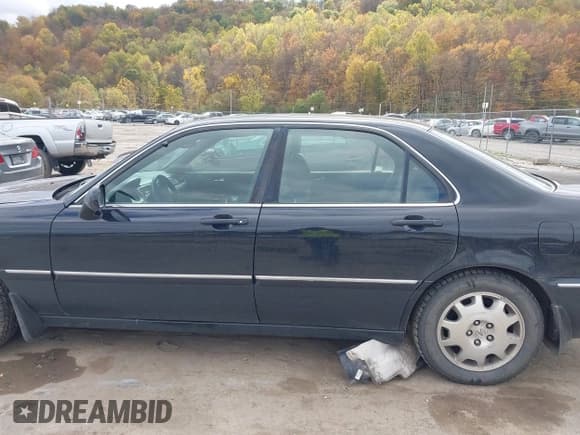 ✅ 2004 Acura RL w/Navigation System • VIN: JH4KA96674C004605 • Lot: 43509408. Listed on IAAI with 175,975 mi. Free auction sales archive from the USA and detailed vehicle history report at DreamBid. Image 14.