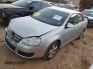 ✅ 2009 Volkswagen Jetta S • VIN: 3VWJM71KX9M097779 • Lot: 43749490. Listed on IAAI with 75,266 mi. Free auction sales archive from the USA and detailed vehicle history report at DreamBid. Image 2.