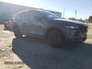 ✅ 2021 Mazda CX-5 Carbon Edition • VIN: JM3KFBCY3M0447651 • Лот: 91376115. Опубликован ранее на Copart с пробегом 22 165 миль. Бесплатный доступ к архиву аукционных продаж из США и подробный отчёт об истории автомобиля на DreamBid. Изображение 4.