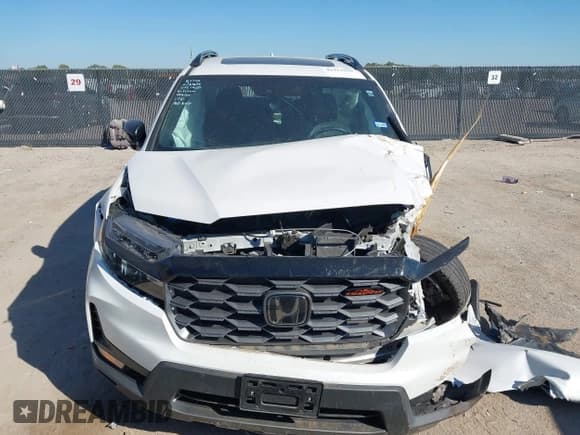 ✅ 2023 Honda Passport TrailSport • VIN: 5FNYF8H63PB017685 • Lot: 43421966. Listed on IAAI with 23,443 mi. Free auction sales archive from the USA and detailed vehicle history report at DreamBid. Image 12.