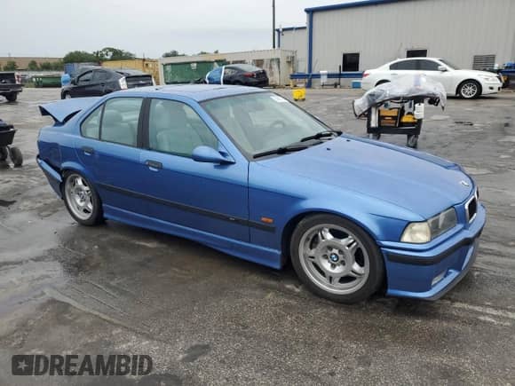 1998 BMW 3 Series M3s with VIN WBSCD932XWEE08788, listed as a Copart auction lot 59890125 with 207,434 mi miles and Salvage title. Bid and sale history available at DreamBid. Image 4.