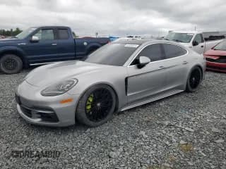✅ 2018 Porsche Panamera 4 E-Hybrid • VIN: WP0AE2A7XJL128212 • Lot: 62028315. Wystawiony na Copart z przebiegiem 69 763 mil. Bezpłatny archiwum sprzedaży aukcyjnych z USA i szczegółowy raport historii pojazdu na DreamBid. Zdjęcie 1.