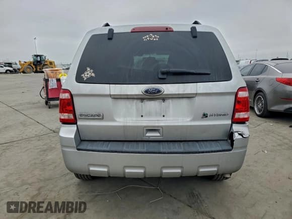 ✅ 2010 Ford Escape Hybrid • VIN: 1FMCU5K3XAKC65709 • Lot: 95794955. Wystawiony na Copart z przebiegiem 166 781 mil. Bezpłatny archiwum sprzedaży aukcyjnych z USA i szczegółowy raport historii pojazdu na DreamBid. Zdjęcie 6.