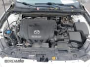 ✅ 2015 Mazda 3 i Touring • VIN: JM1BM1V73F1250988 • Lot: 43565311. Listed on IAAI with 130,297 mi. Free auction sales archive from the USA and detailed vehicle history report at DreamBid. Image 10.