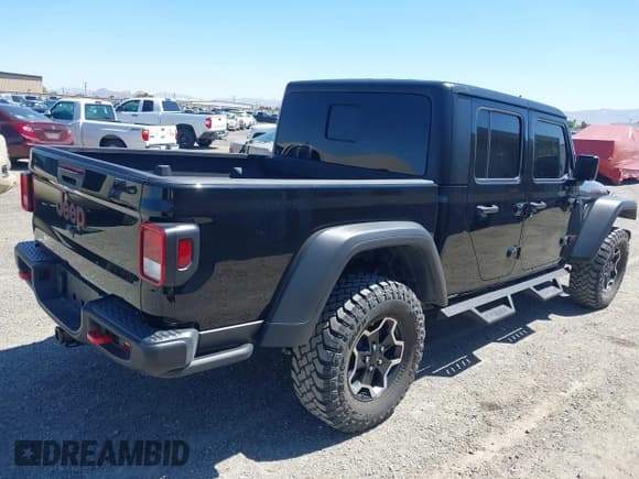 ✅ 2023 Jeep Gladiator Rubicon • VIN: 1C6JJTBG3PL531982 • Lot: 42211139. Listed on IAAI with 28,301 mi. Free auction sales archive from the USA and detailed vehicle history report at DreamBid. Image 4.