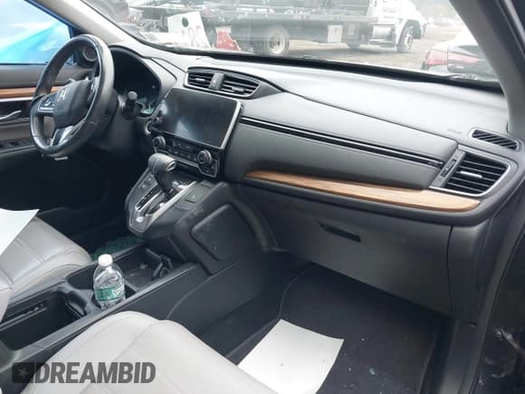 ✅ 2019 Honda CR-V Touring • VIN: 2HKRW2H99KH602129 • Lot: 43855817. Listed on IAAI with 91,135 mi. Free auction sales archive from the USA and detailed vehicle history report at DreamBid. Image 5.