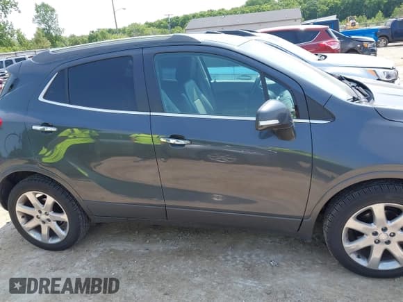 ✅ 2016 Buick Encore Leather • VIN: KL4CJCSBXGB660100 • Lot: 42410534. Listed on IAAI with 116,155 mi. Free auction sales archive from the USA and detailed vehicle history report at DreamBid. Image 13.