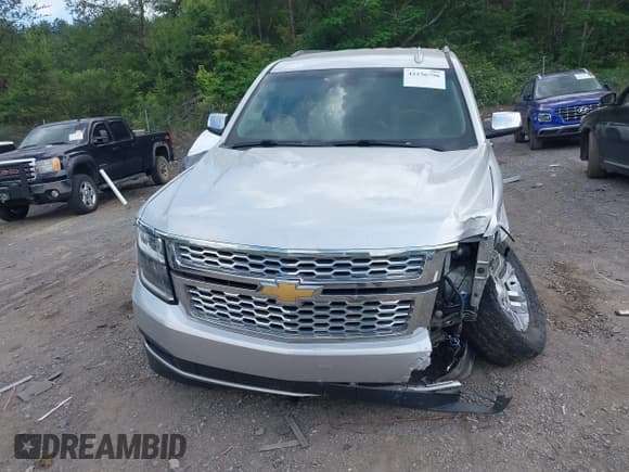 ✅ 2018 Chevrolet Tahoe LT • VIN: 1GNSCBKC3JR112590 • Lot: 42156796. Listed on IAAI with 124,120 mi. Free auction sales archive from the USA and detailed vehicle history report at DreamBid. Image 12.