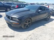 ✅ 2005 Ford Mustang GT Deluxe • VIN: 1ZVFT82H255119937 • Lot: 42342433. Listed on IAAI with 149,435 mi. Free auction sales archive from the USA and detailed vehicle history report at DreamBid. Image 2.