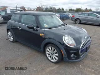 ✅ 2017 MINI Hardtop Cooper • VIN: WMWXP5C30H3C64584 • Lot: 43565662. Listed on IAAI with 86,392 mi. Free auction sales archive from the USA and detailed vehicle history report at DreamBid. Image 1.