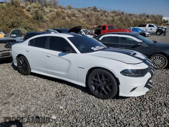 2022 Dodge Charger R/T с VIN 2C3CDXCT6NH203336, выставлен на аукционе Copart как лот 71093115 с пробегом Не указан миль и Списание • Salvage title. История ставок и продаж доступна на DreamBid. Изображение 4.