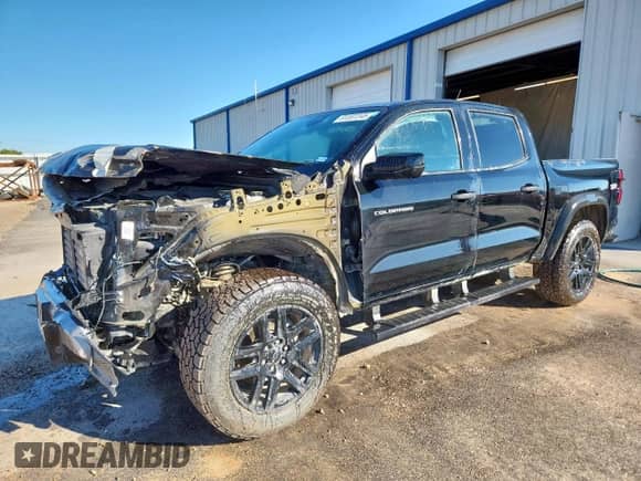 2023 Chevrolet Colorado 4WD Trail Boss с VIN 1GCPTEEK0P1205948, выставлен на аукционе Copart как лот 91307245 с пробегом Не указан миль и Списание • Salvage title. История ставок и продаж доступна на DreamBid. Изображение 1.