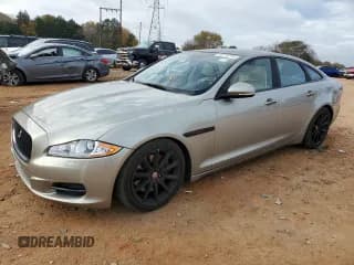 ✅ 2014 Jaguar XJ • VIN: SAJWA1CZ5E8V71971 • Lot: 82116114. Wystawiony na Copart z przebiegiem 127 164 mil. Bezpłatny archiwum sprzedaży aukcyjnych z USA i szczegółowy raport historii pojazdu na DreamBid. Zdjęcie 1.