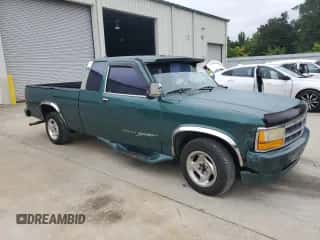 1993 Dodge Dakota z VIN 1B7FL23X3PS153914, wystawiony jako Copart lot #67756425 z przebiegiem 277 083 mil mil oraz Szkoda całkowita • Salvage title. Historia ofert i sprzedaży dostępna na DreamBid. Obrazek 4.