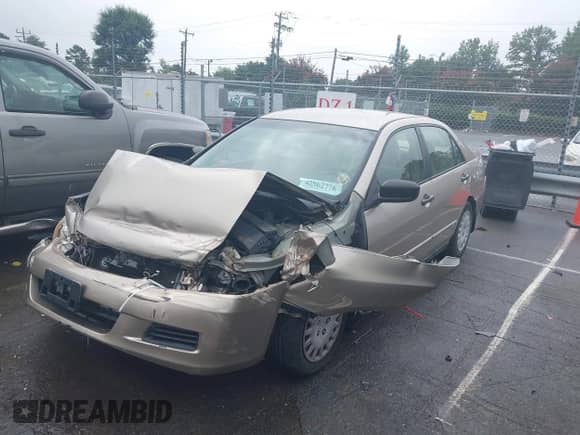 2007 Honda Accord VP with VIN JHMCM56157C010867, listed as a IAAI auction lot 42962776 with 195,413 mi miles and . Bid and sale history available at DreamBid. Image 2.