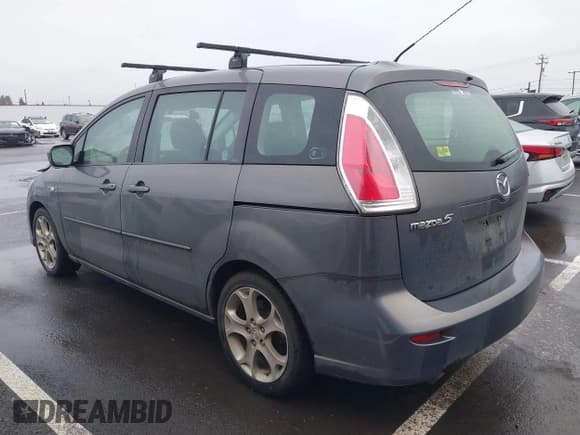 ✅ 2009 Mazda 5 Touring • VIN: JM1CR29L690356302 • Lot: 41573737. Listed on IAAI with 127,276 mi. Free auction sales archive from the USA and detailed vehicle history report at DreamBid. Image 3.