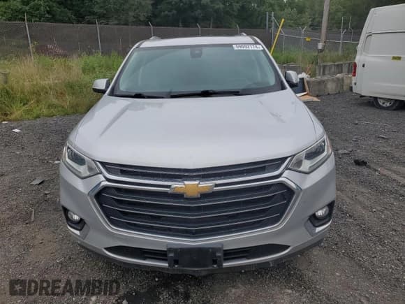 ✅ 2018 Chevrolet Traverse Premier • VIN: 1GNERKKW7JJ114802 • Lot: 69092174. Wystawiony na Copart z przebiegiem 97 276 mil. Bezpłatny archiwum sprzedaży aukcyjnych z USA i szczegółowy raport historii pojazdu na DreamBid. Zdjęcie 5.