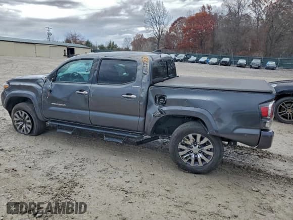 ✅ 2022 Toyota Tacoma Limited • VIN: 3TMGZ5AN2NM481353 • Lot: 93691655. Listed on Copart with 51,820 mi. Free auction sales archive from the USA and detailed vehicle history report at DreamBid. Image 2.