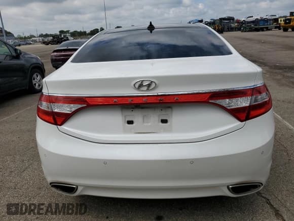 ✅ 2013 Hyundai Azera • VIN: KMHFH4JG8DA330471 • Лот: 70114735. Опубликован ранее на Copart с пробегом 107 874 миль. Бесплатный доступ к архиву аукционных продаж из США и подробный отчёт об истории автомобиля на DreamBid. Изображение 6.