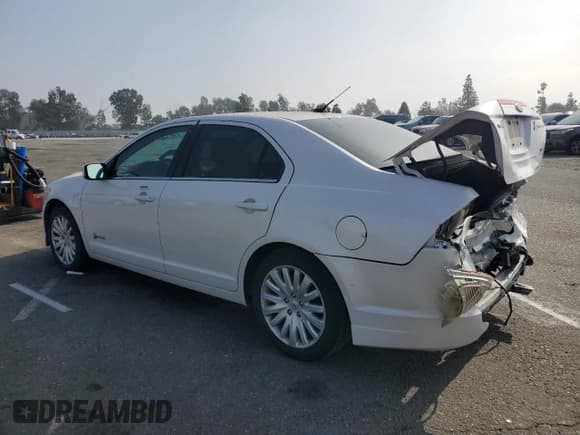 ✅ 2012 Ford Fusion Hybrid • VIN: 3FADP0L37CR270114 • Лот: 85205455. Опубликован ранее на Copart с пробегом 188 333 миль. Бесплатный доступ к архиву аукционных продаж из США и подробный отчёт об истории автомобиля на DreamBid. Изображение 2.