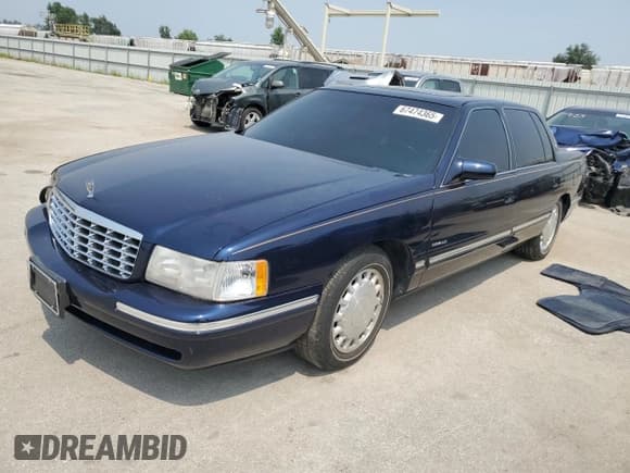 ✅ 1997 Cadillac DeVille • VIN: 1G6KD54Y2VU264494 • Lot: 67474365. Listed on Copart with 142,504 mi. Free auction sales archive from the USA and detailed vehicle history report at DreamBid. Image 1.
