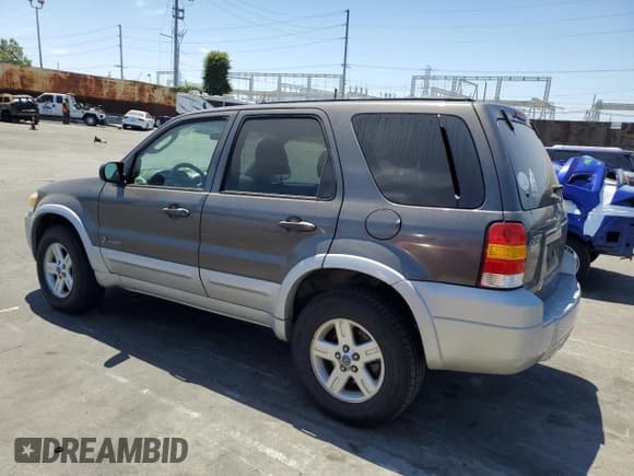 ✅ 2005 Ford Escape Hybrid • VIN: 1FMCU95H35KC95221 • Lot: 67789924. Wystawiony na Copart z przebiegiem 169 260 mil. Bezpłatny archiwum sprzedaży aukcyjnych z USA i szczegółowy raport historii pojazdu na DreamBid. Zdjęcie 2.