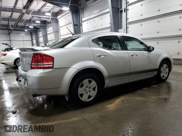 ✅ 2010 Dodge Avenger SXT • VIN: 1B3CC4FB1AN169194 • Лот: 80318604. Опубликован ранее на Copart с пробегом 106 184 миль. Бесплатный доступ к архиву аукционных продаж из США и подробный отчёт об истории автомобиля на DreamBid. Изображение 3.