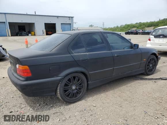 1998 BMW 3 Series 328i with VIN WBACD4329WAV60069, listed as a Copart auction lot 57724115 with 113,414 mi miles and Clean title. Bid and sale history available at DreamBid. Image 3.