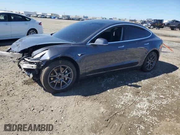 ✅ 2020 Tesla Model 3 Standard Range Plus • VIN: 5YJ3E1EA3LF644345 • Lot: 86067975. Listed on Copart with 49,714 mi. Free auction sales archive from the USA and detailed vehicle history report at DreamBid. Image 1.