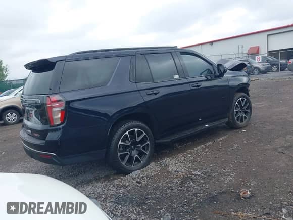 2021 Chevrolet Tahoe RST with VIN 1GNSKRKD6MR493215, listed as a IAAI auction lot 42637936 with 43,116 mi miles and . Bid and sale history available at DreamBid. Image 4.