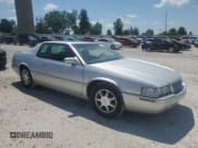 ✅ 2002 Cadillac Eldorado Touring • VIN: 1G6ET12942B102314 • Lot: 62061185. Listed on Copart with 64,069 mi. Free auction sales archive from the USA and detailed vehicle history report at DreamBid. Image 4.