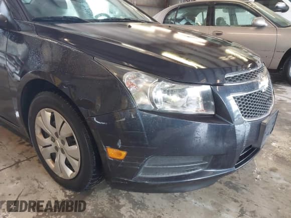 ✅ 2014 Chevrolet Cruze LS • VIN: 1G1PA5SH7E7476880 • Lot: 43552553. Wystawiony na IAAI z przebiegiem 138 795 mil. Bezpłatny archiwum sprzedaży aukcyjnych z USA i szczegółowy raport historii pojazdu na DreamBid. Zdjęcie 6.